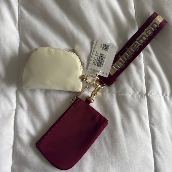 75&76 Lululemon Dual Pouch Wristlet Wordmark - Deep Luxe Gold Bone - Picture 6 of 7